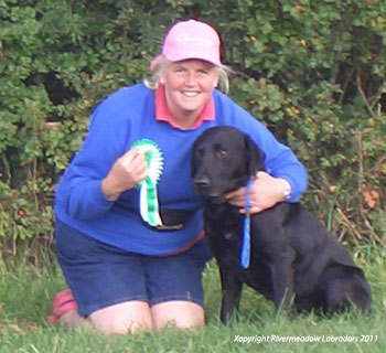 Fife with mum showing off his rosettes